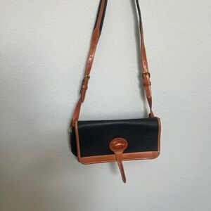 Dooney and Bourke Classic Black and Tan Genuine Leather Shoulder Bag